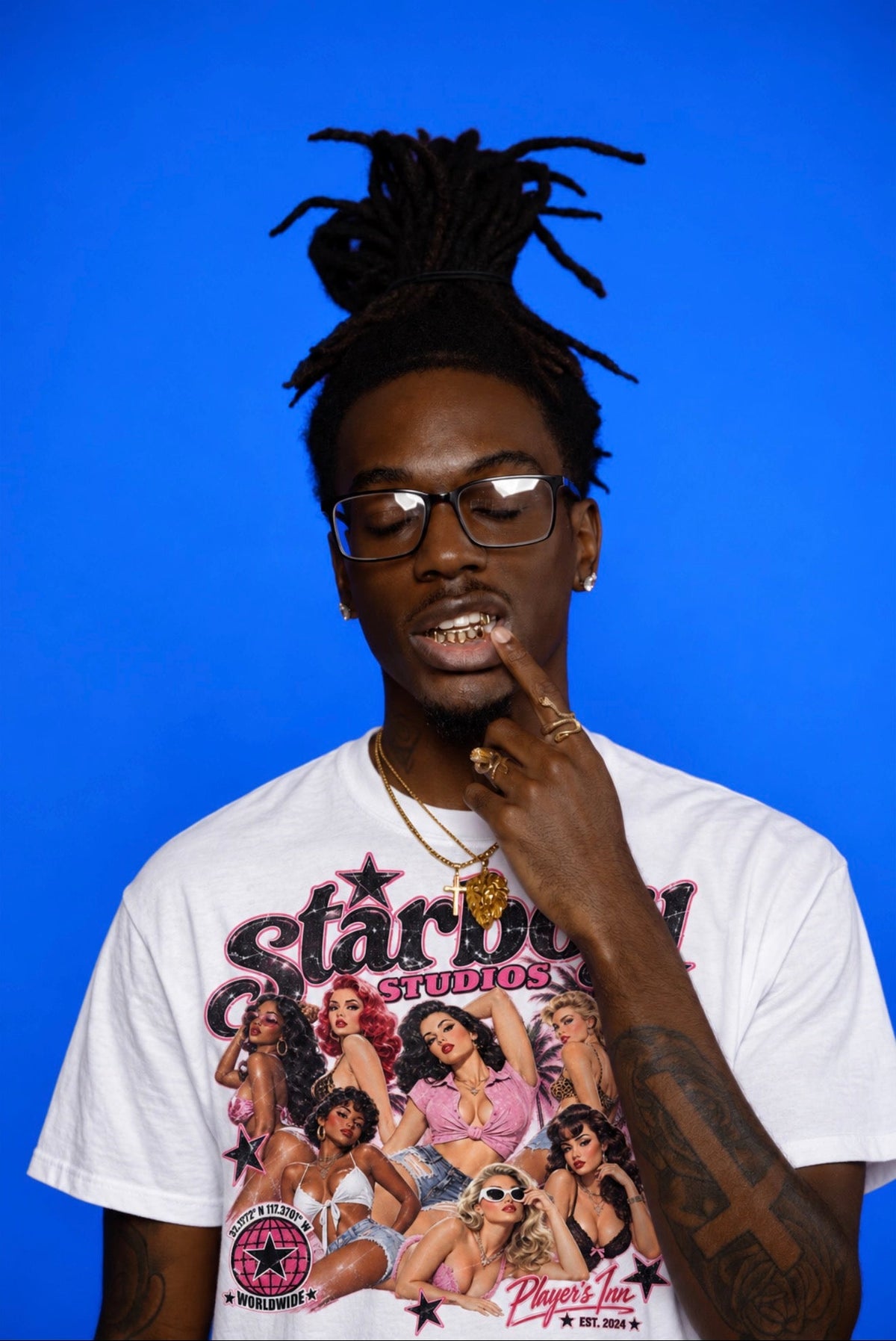 Player's Inn illustrated Starboy graphic tee editorial on blue